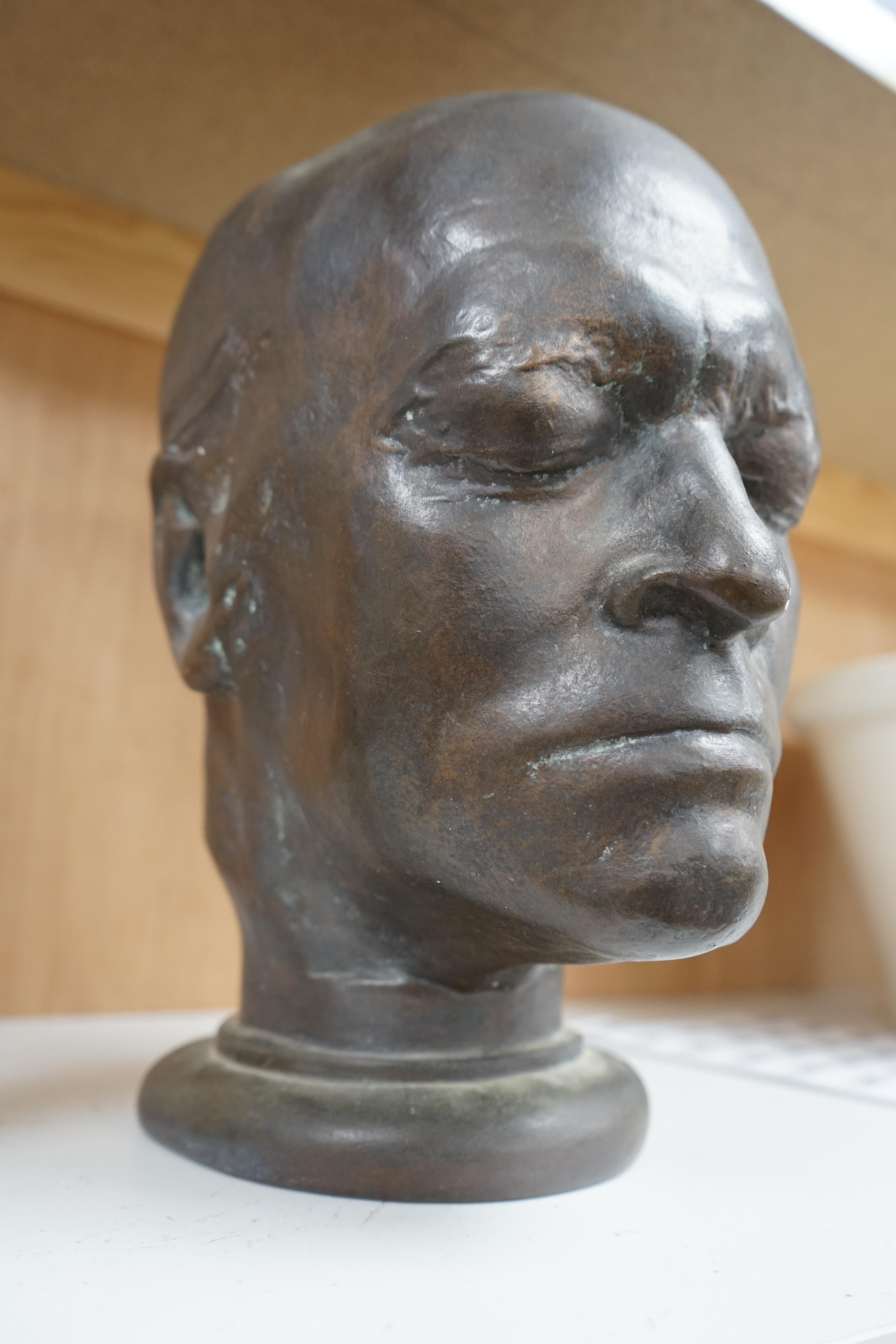 After James Deville, a bronzed plaster bust of William Blake, 28cm high. Condition - bronzed paint scratch to nose showing plaster